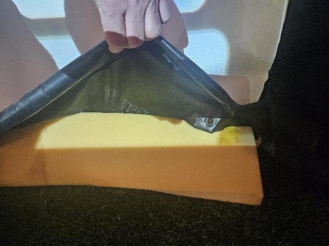 A person holding a piece of foam

AI-generated content may be incorrect.